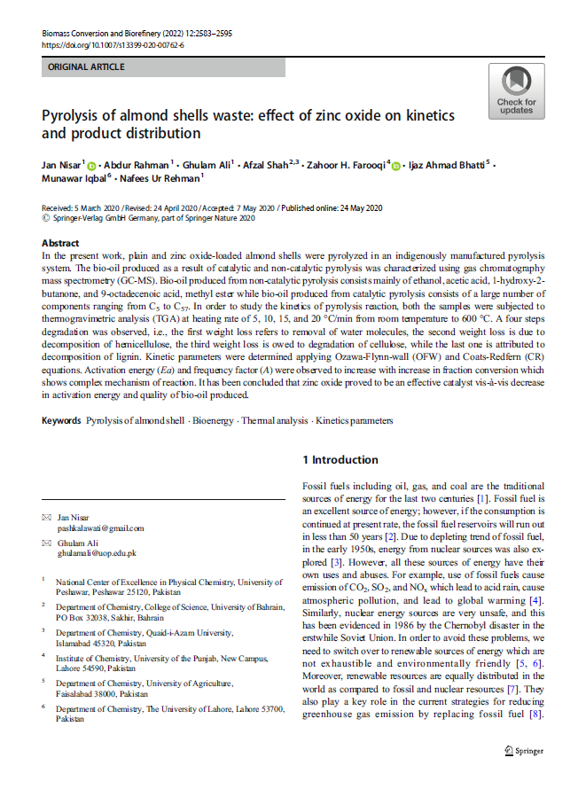 Pyrolysis of almond shells waste: effect of zinc oxide on kinetics and product distribution